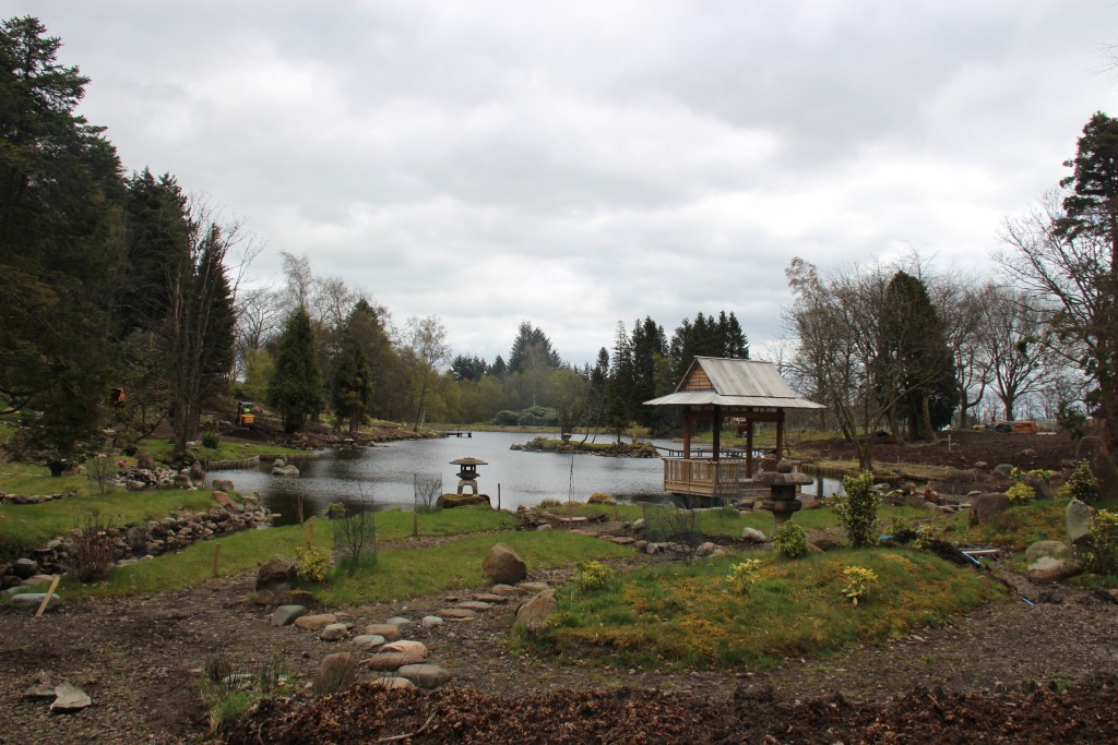 The garden at Cowden showing the newly constructed rest house at the edge of the lake