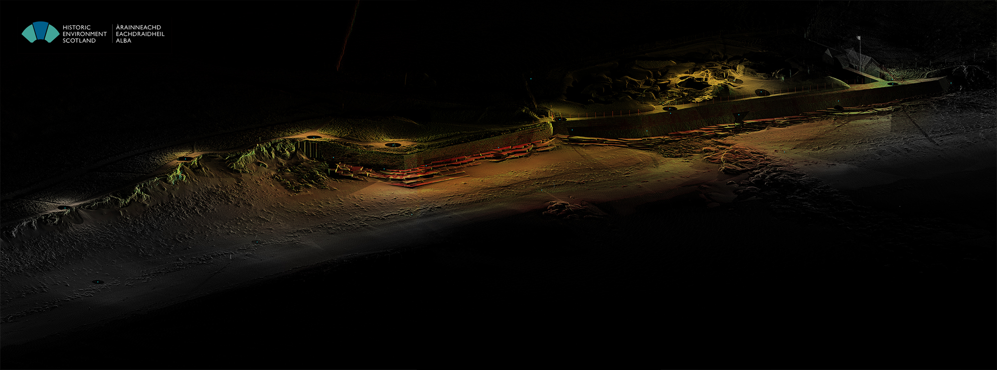 General view of the point cloud at Skara Brae from the NE, showing the protective sea wall and sand dunes to either side of it. The Neolithic village is visible at the top right part of the image.