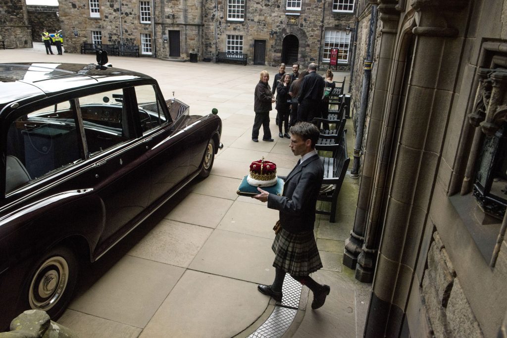 The Duke of Hamilton with the 500 year old Crown of Scotland in the Crown courtyard, Edinburgh Castle. 