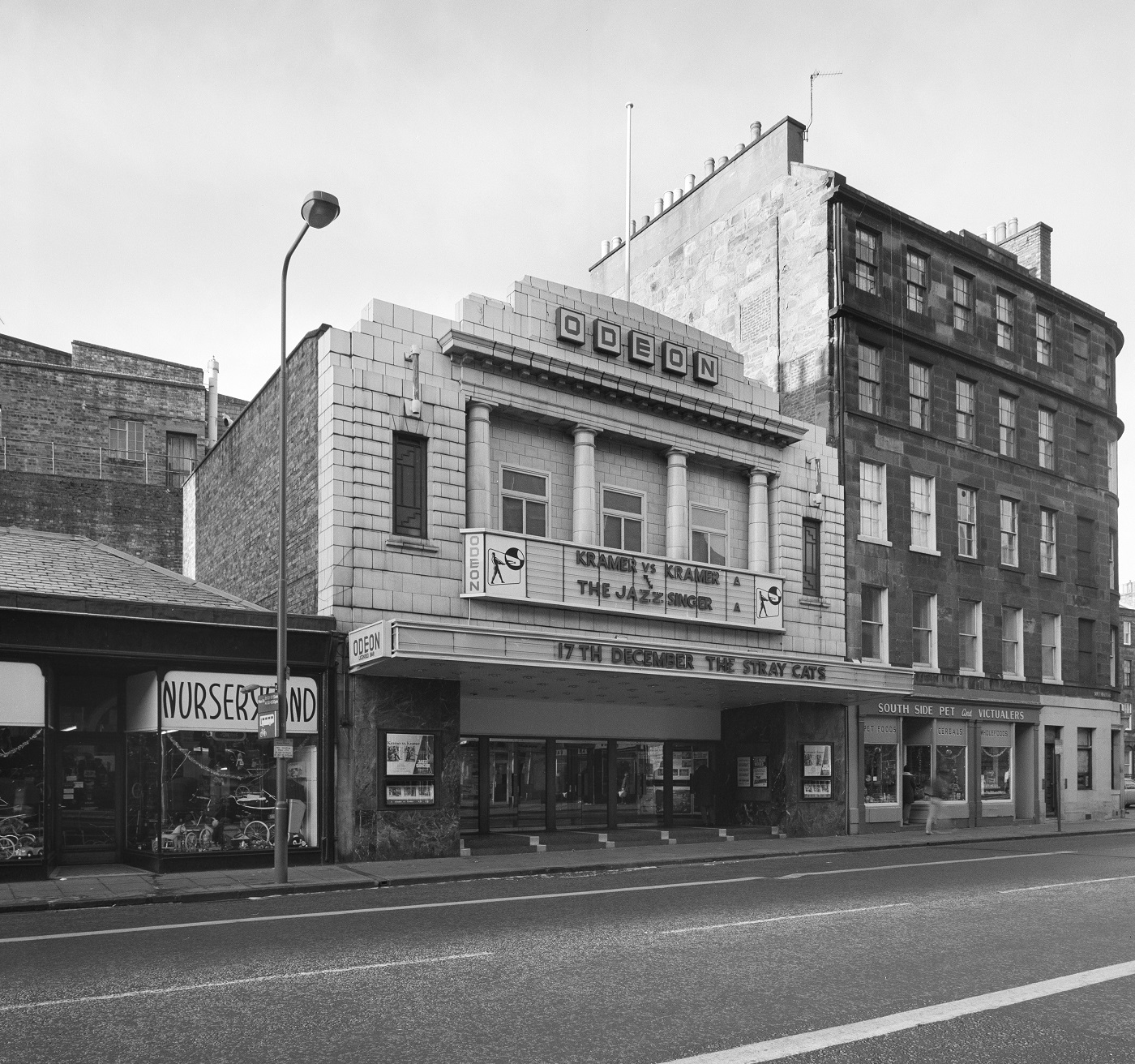 A black and white picture of the Odeon cinema