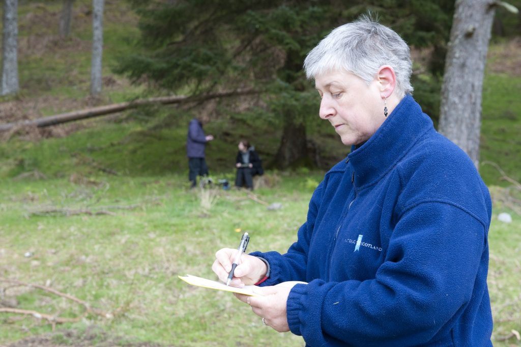 A field officer for the Historic Environment Scotland scheduling team in Argyll