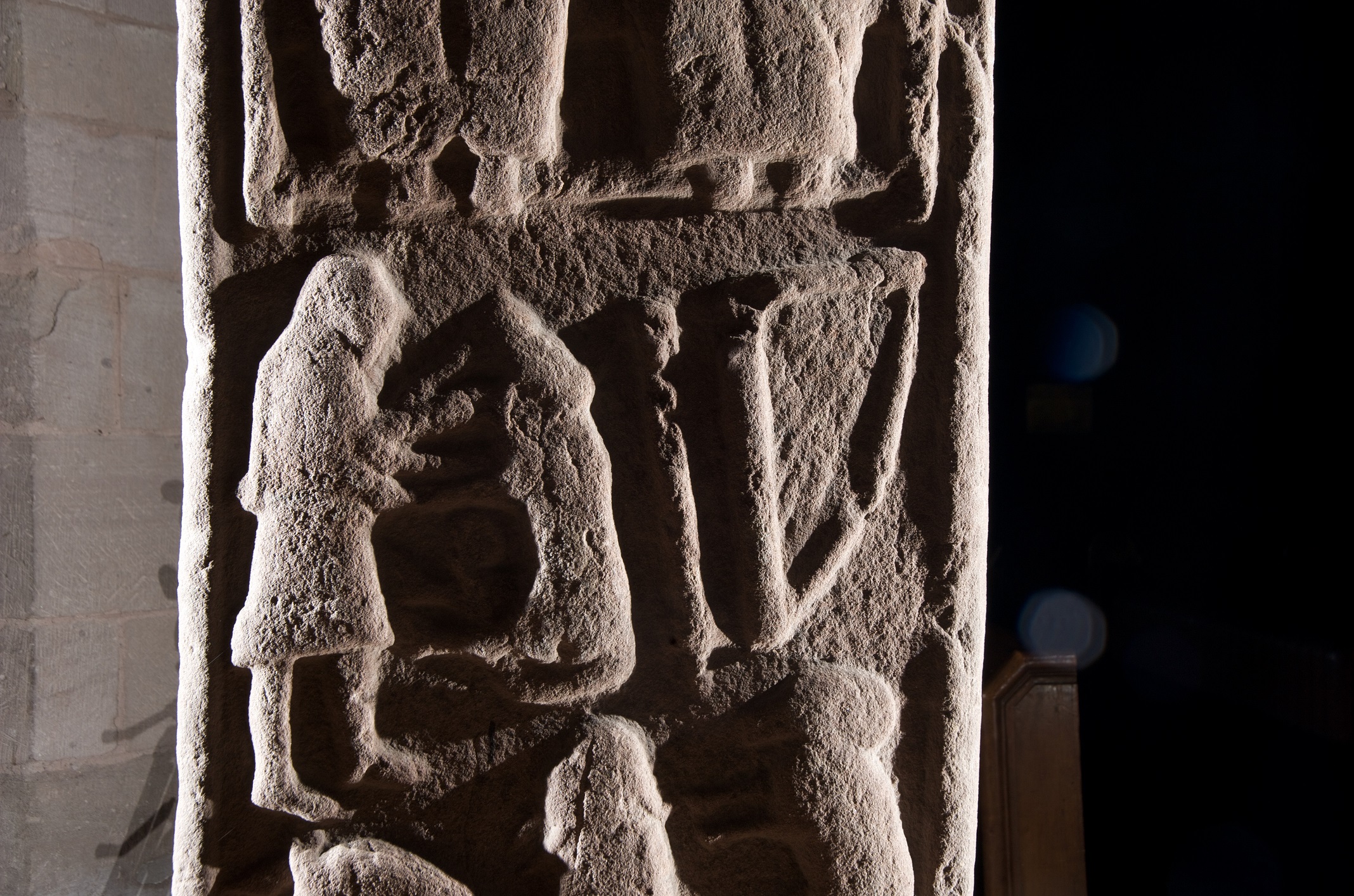 Detail of the back of the Aldbar Stone. This Pictish stone, now situated in Brechin Cathedral, shows the figures of David wrestling with a lion.