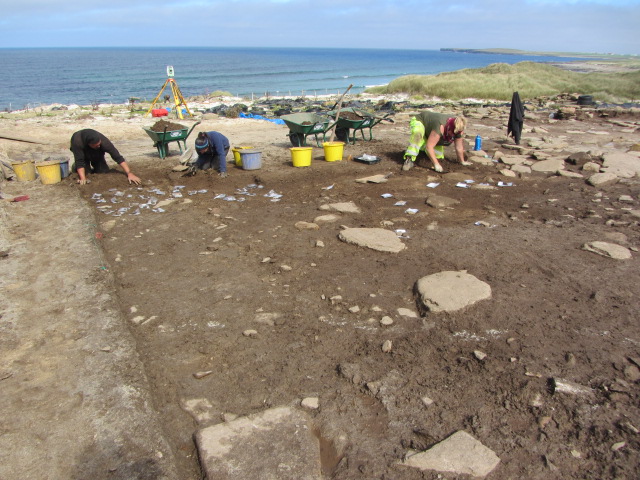 Dan, Anna and Emily uncovering the late Neolithic remains. The area on the left revealed a huge number of flint tools and flakes.