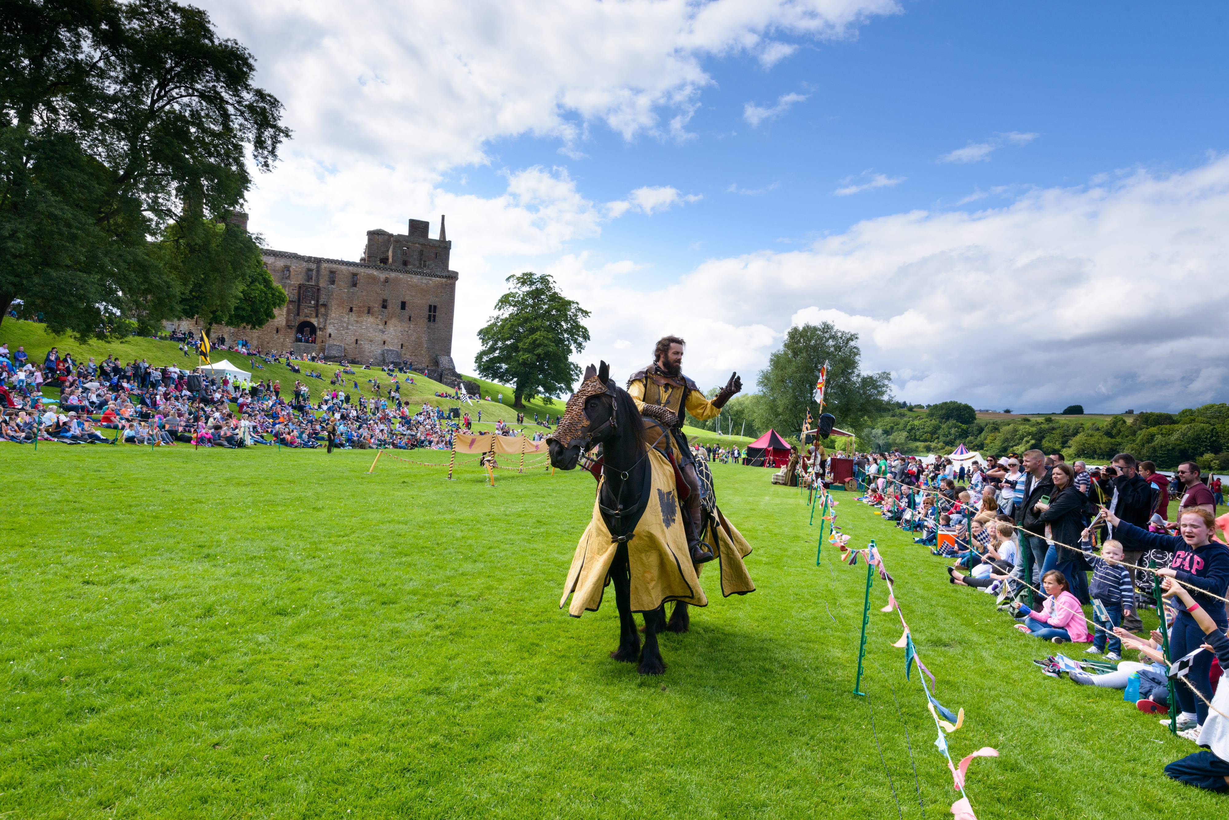 Jousting 2015 at Linlithgow Palace. Spectacular Jousting event and historical re-enactor in the living history camp. New company of jousters, Les Amis d'Onno.