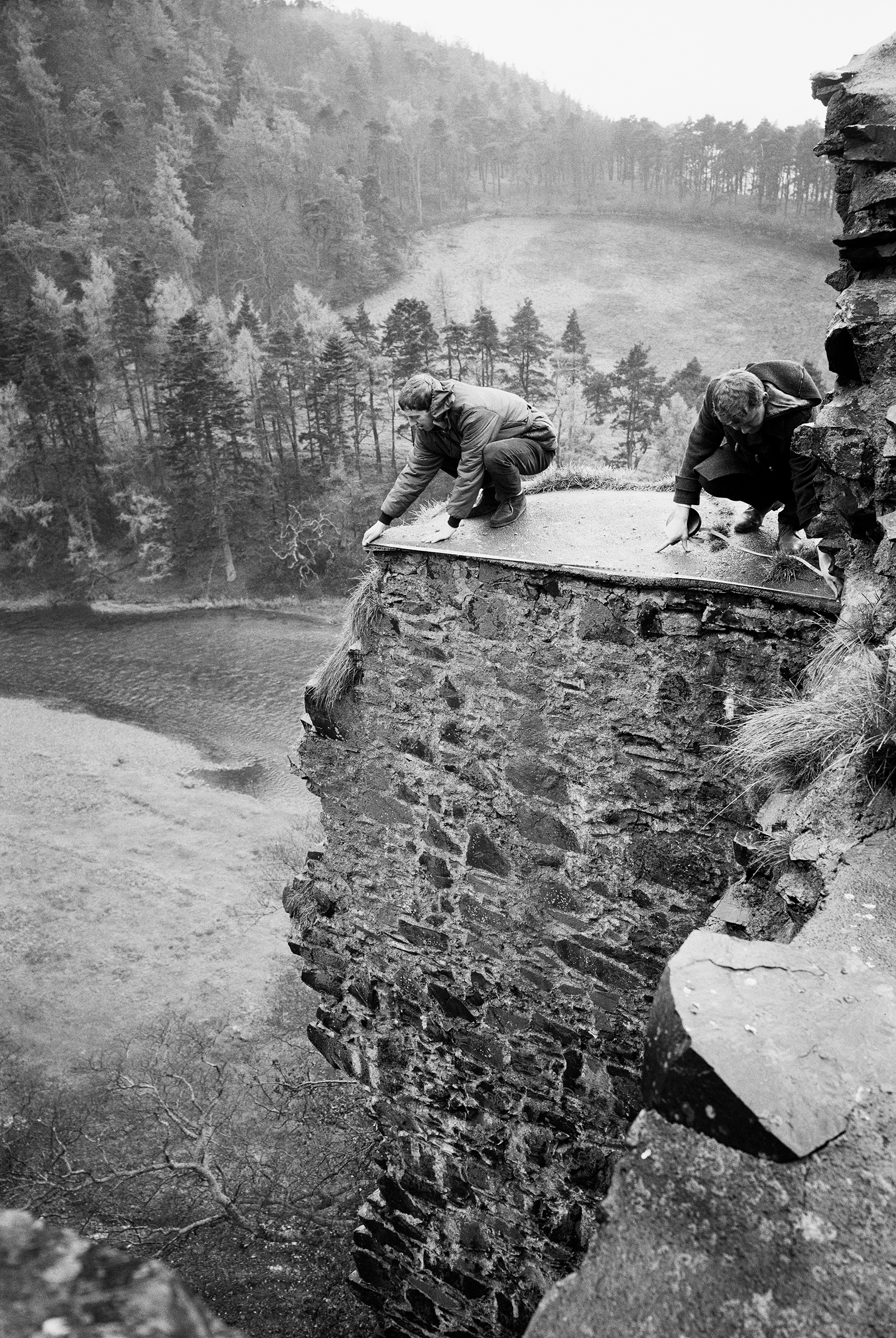 Survey team in action at Neidpath Castle; left, Sam Scott, right, Douglas Fleming ©HES ‘Health and safety was important in the 1970s, and Wallabee shoes are very non-slip.’
