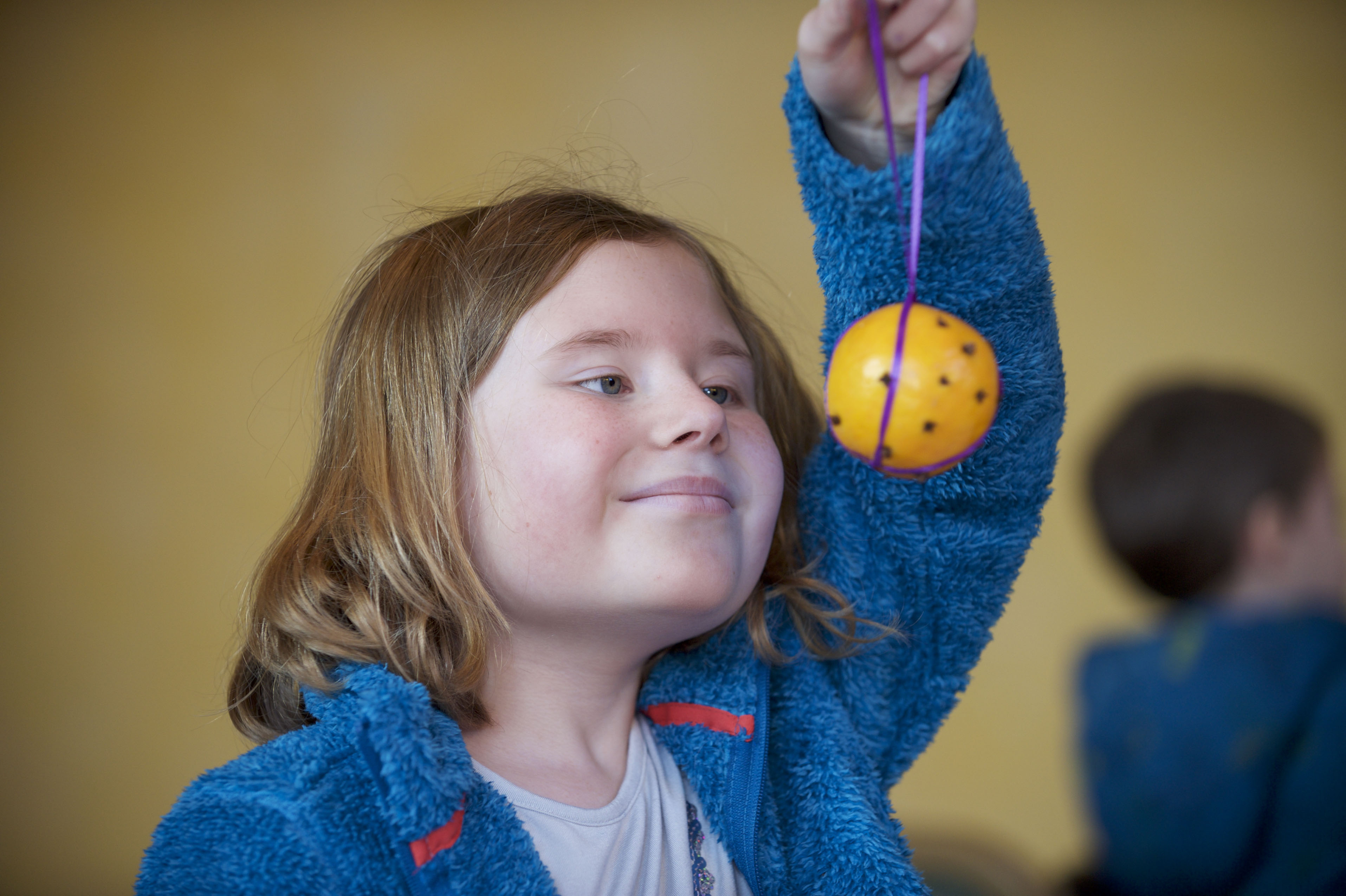 A girl with a self made pomander