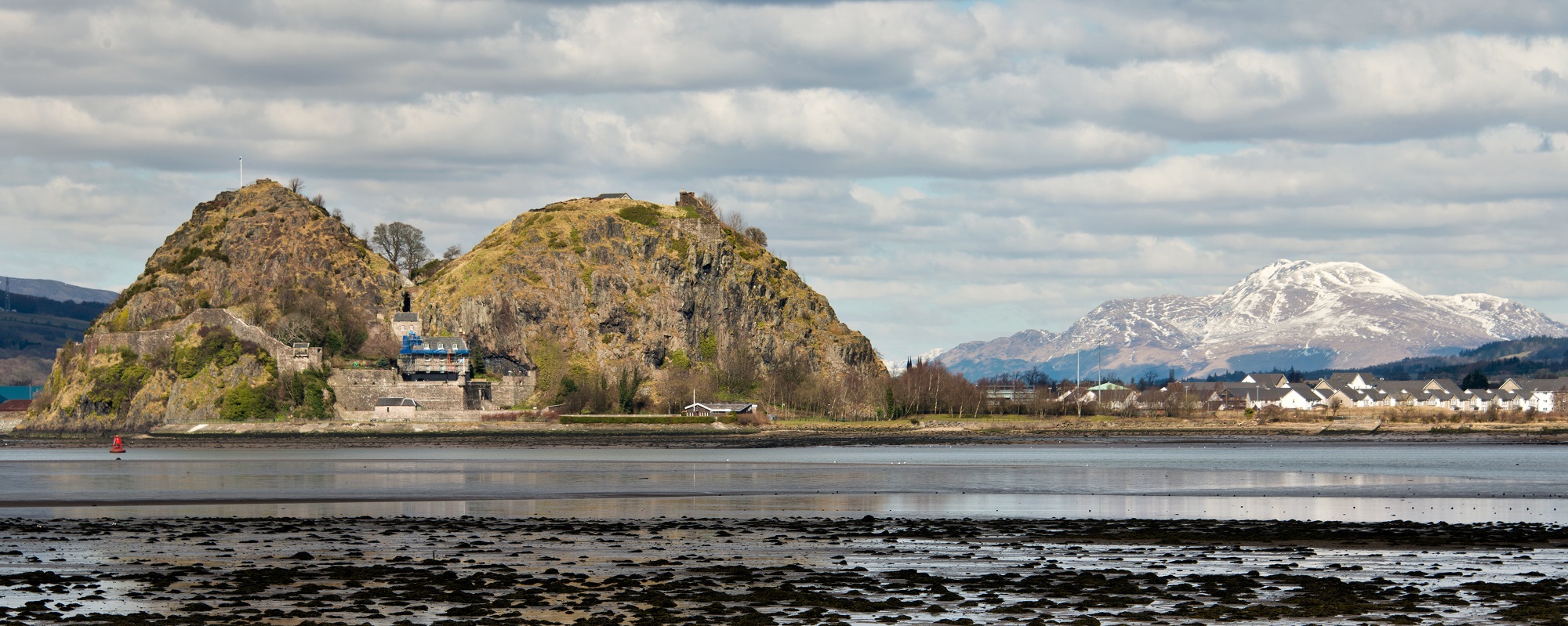 Dumbarton Castle with snow covered Ben Lomond in the background