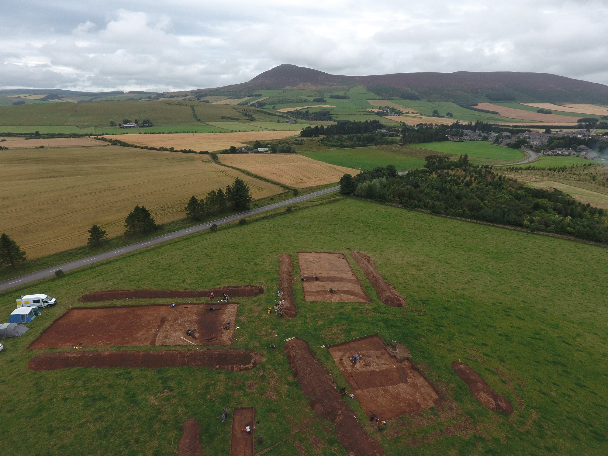 Fieldwork at Rhynie in 2016. The boundaries of the high status enclosure complex at Rhynie can be seen in the trenches – centuries of ploughing have flattened the ditches and wooden walls that encompassed the Pictish site