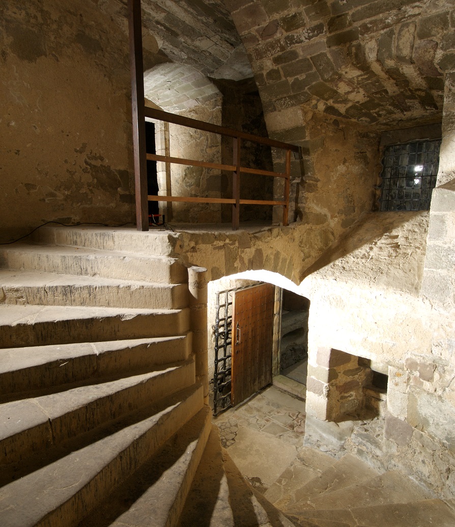 The main staircase, looking down towards the front door at Elcho Castle. Behind it is the yett