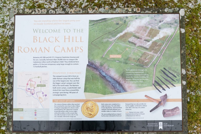 Interpretation panel with text and a drawing of a Roman camp 