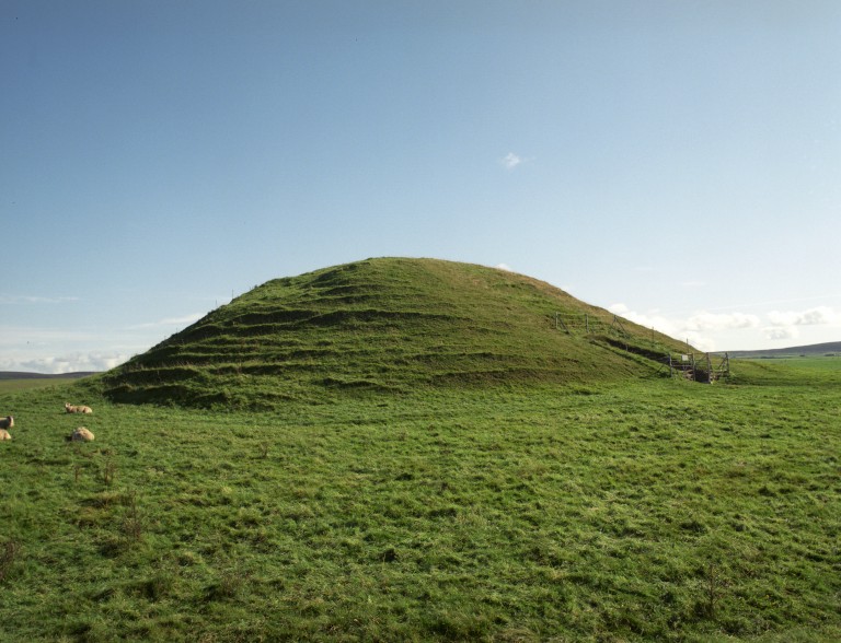 A grass covered mound 