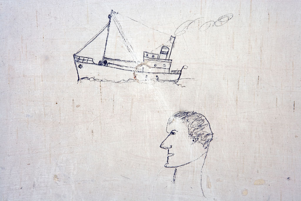 Image of a worker's doodle of a man looking at a boat