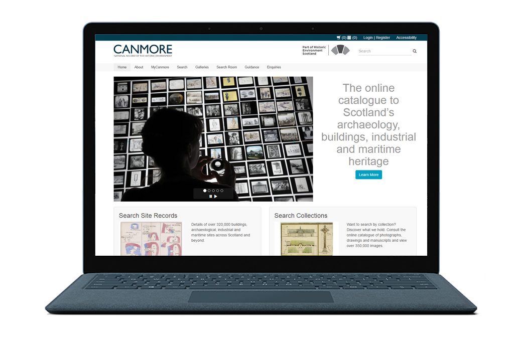 laptop showing the front page of a website with text reading 'canmore, the online catalogue to Scotland's archaeology, buildings, industrial and maritime heritage'