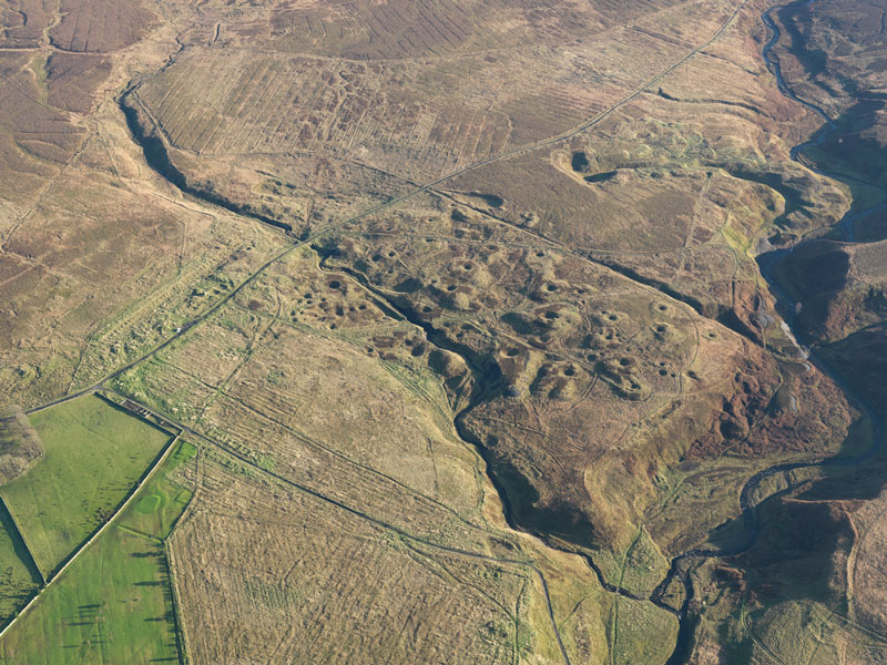 aerial view of a remote landscape with archaeological remains