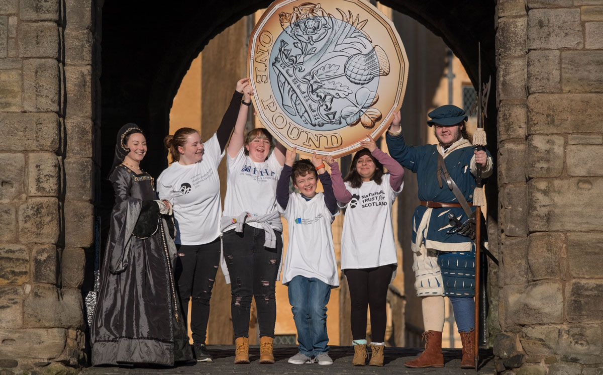 Image of a group of young people launching £1 entry offer to historic sites