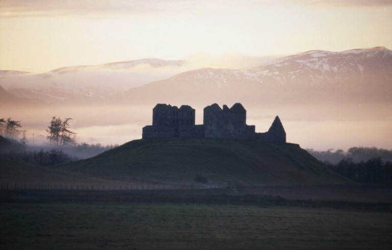 silhouette of building on hill