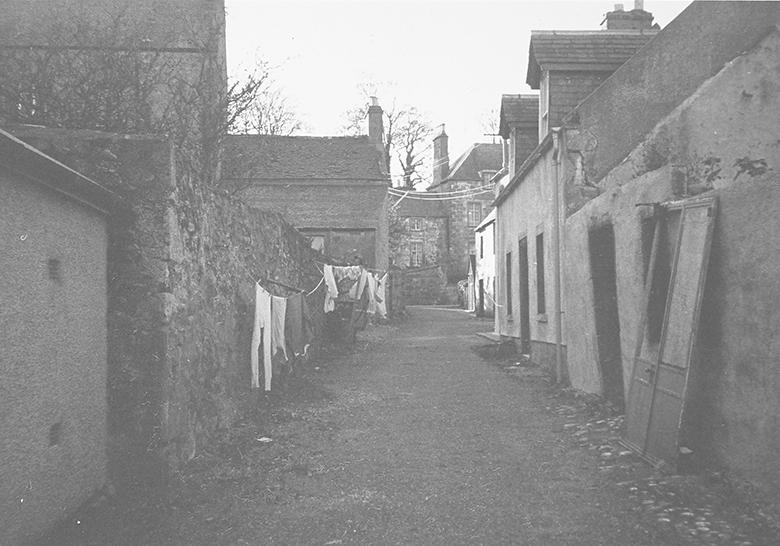 A vennel with washing hanging up