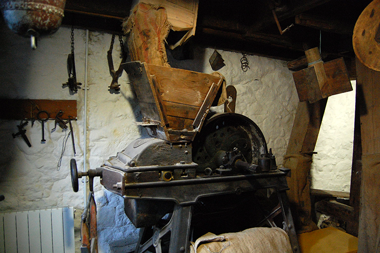 Photo showing the "Oat Bruiser" machinery at New Abbey Corn Mill