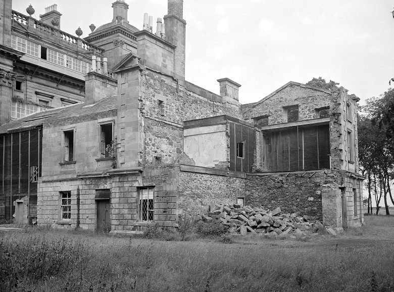 side view of a large building partly demolished