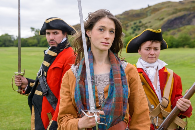 Female Covenanter flanked by two redcoats