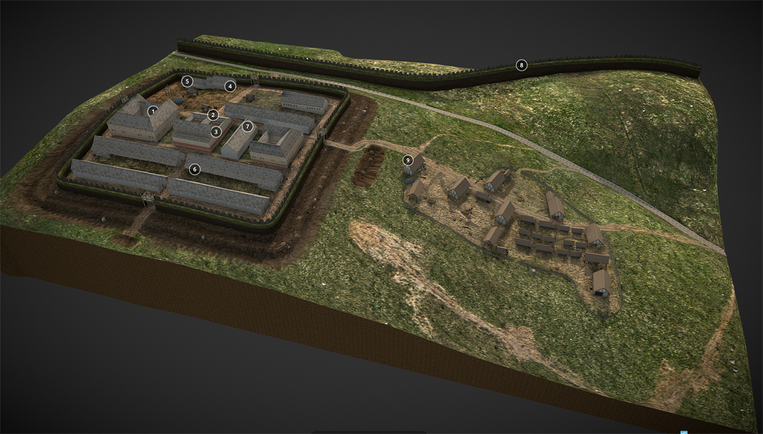 A digital reconstruction of a Roman fort. The fort is located on a hillside beside a large defensive wall. There is a walled section containing orderly military buildings and a village-like collection of buildings outside the walls. 