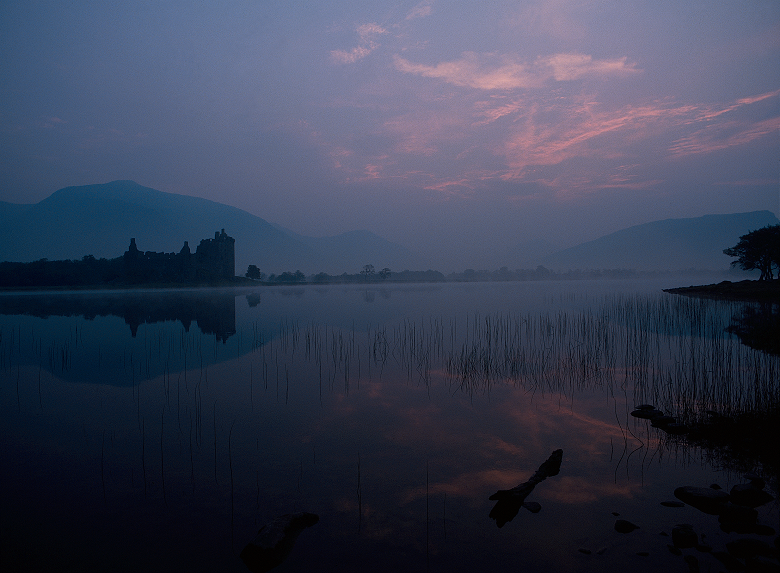 View of Kilchurn Castle across Loch Awe at twilight