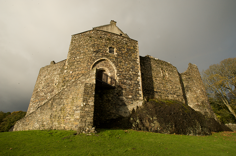 low angled view of Dunstaffnage Castle with a glowering sky