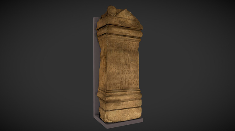 A digital 3D model of a Roman altar. The stone is ornately carved and inscribed with text. 
