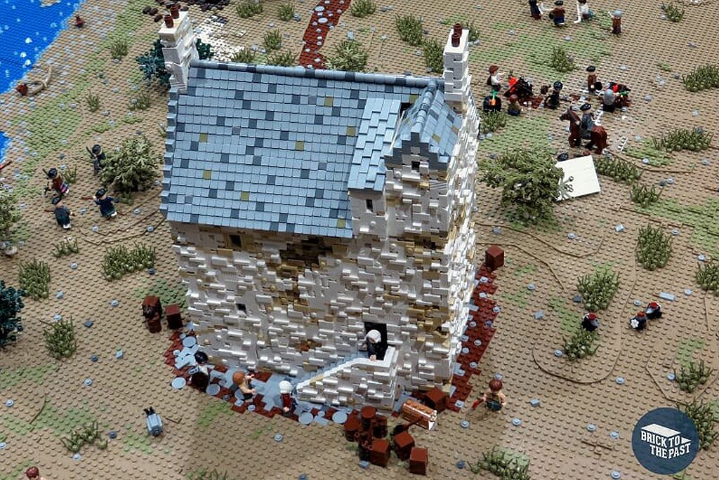 lego model of a white building with grey tiled roof