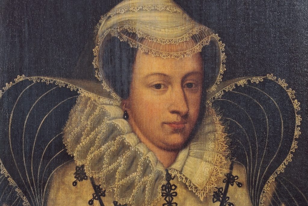 painting of a woman wearing a ruff and lace bonnet