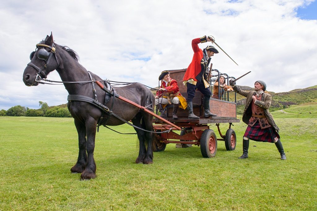 Covenanters attack a horse and cart with a Redcoat in it