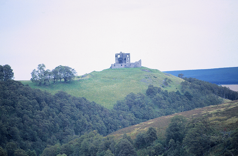 View of Auchindoun Castle perched on a hill
