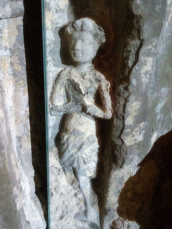 A photo of one of the intricately-carved figures taken with the use of a mirror