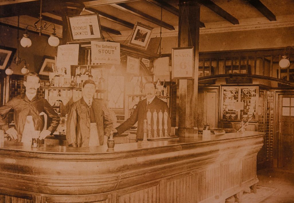 A group of staff stand behind the bar of the Gothenburg pub in Prestonpans