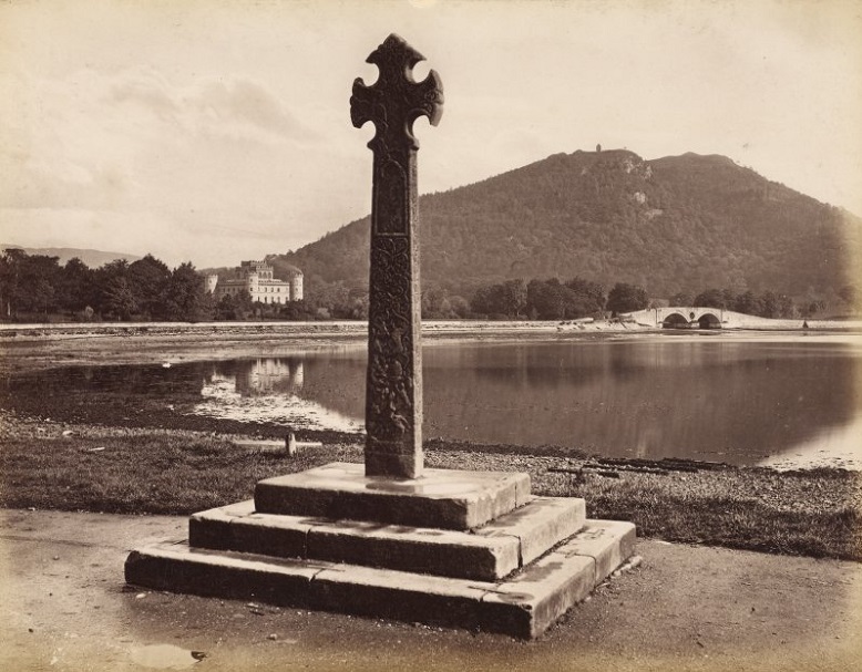 A black and white archive image of the mercat cross