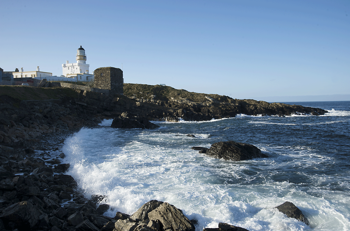 View of Kinnaird Head Lighthouse from the rocky cliffs of Fraserburgh