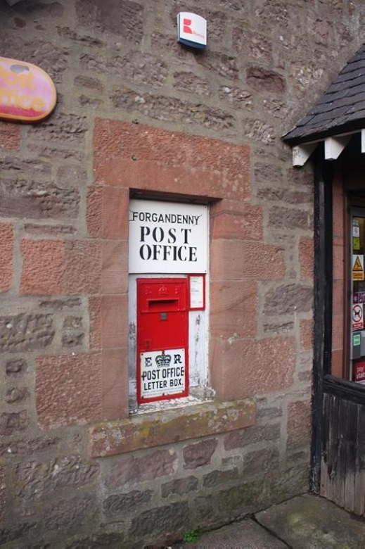 An Edward VIII post box in the wall of the former post office in Forgandenny 