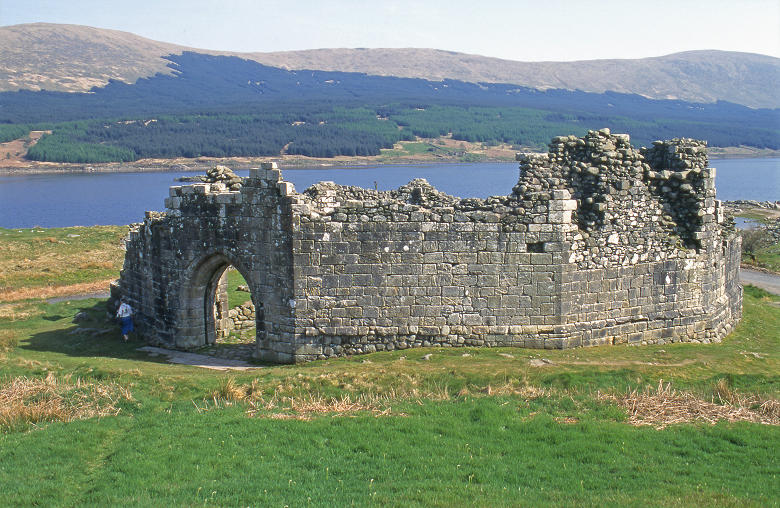 An 11-sided castle reconstructed in front of the loch where it was originally located on an island