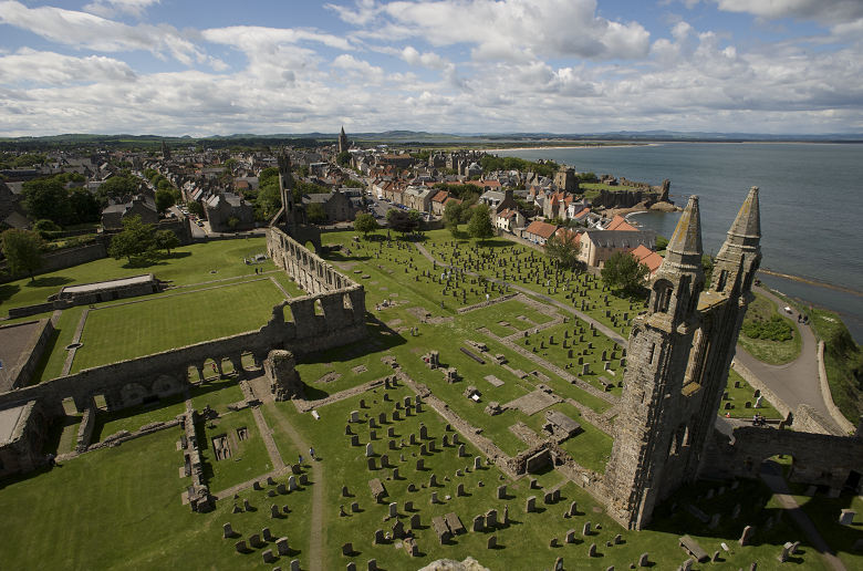 A town and cathedral ruins viewed from above