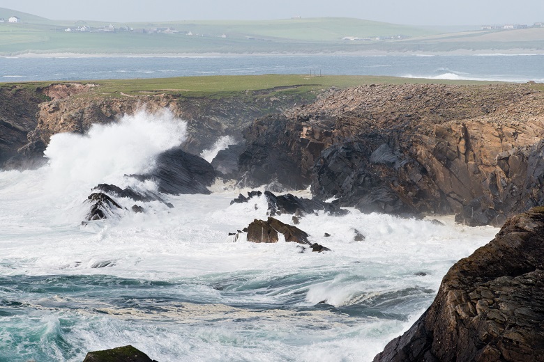 Waves crashing against rocks