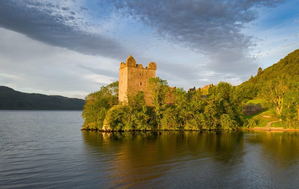 The ruins of a castle beside a loch