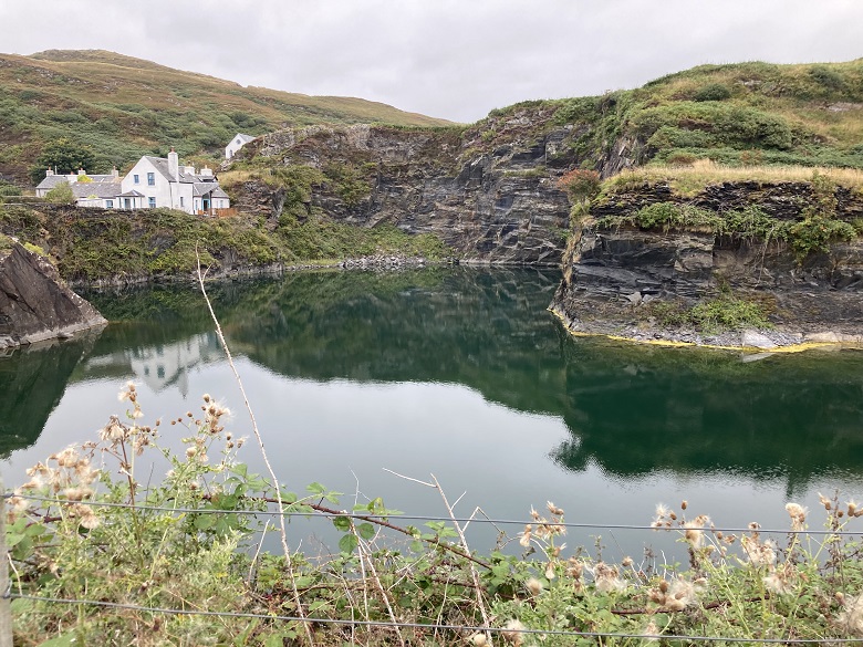 A historic slate quarry, now filled with water