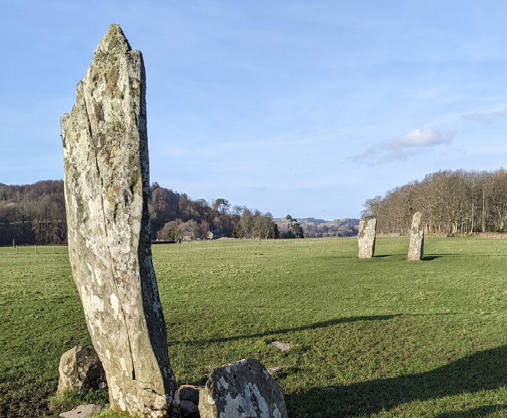 Three standing stones in a field