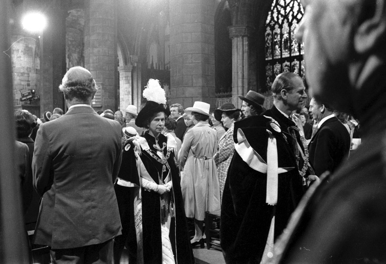 Archive photo of the Queen in ceremonial robes waiting to take part in a church service 