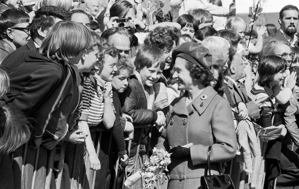 An archive photo of the Queen stopping to chat to residents of Edinburgh who have gathered to see her walk past during a trip to Edinburgh