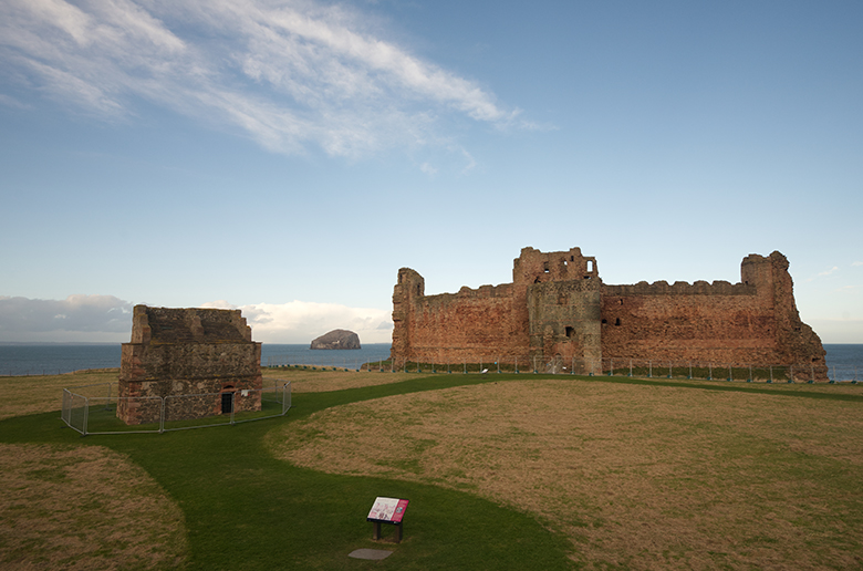 exterior of tantallon castle with metal fencing