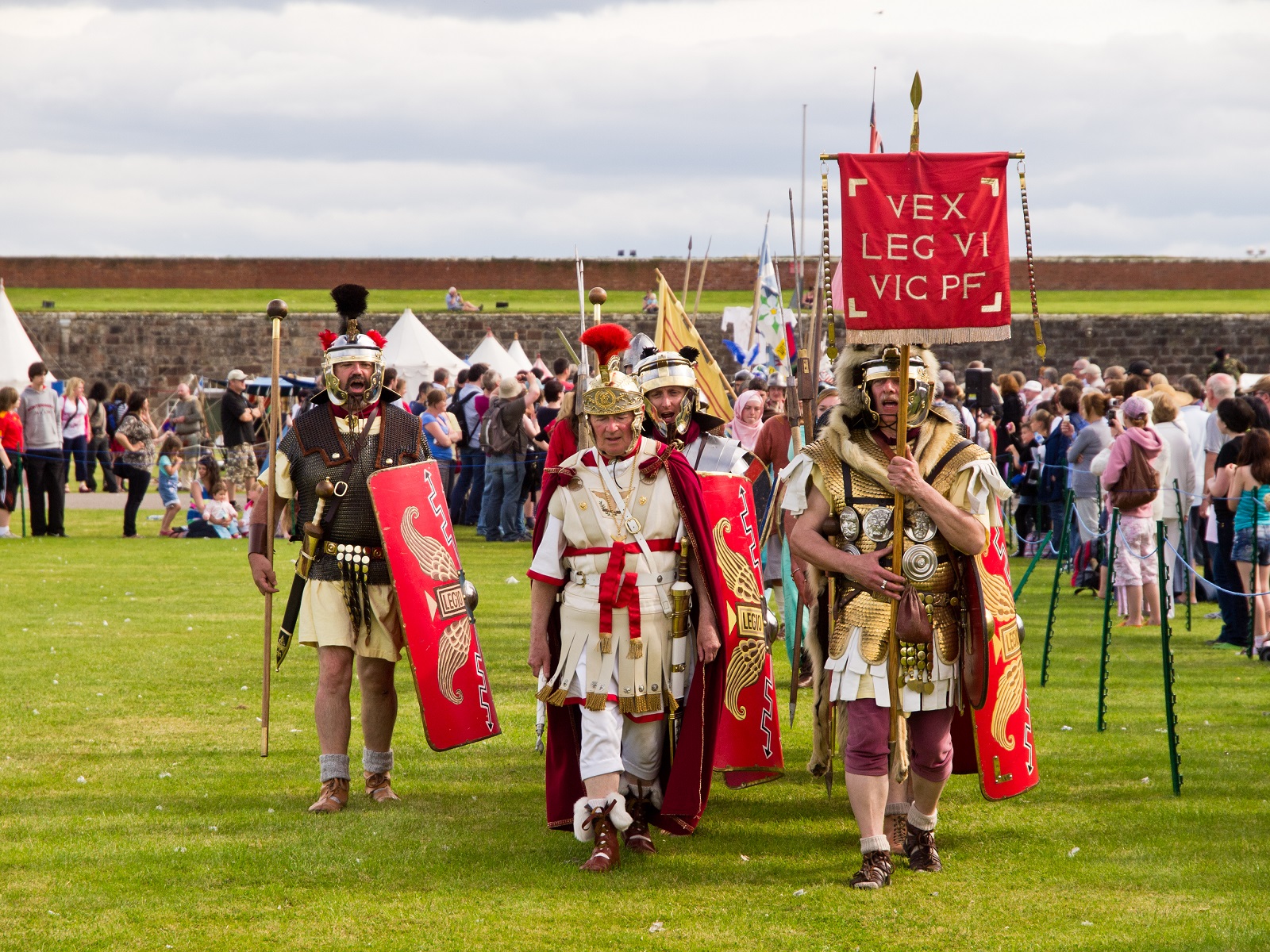 A group of people dressed in re-enactment clothes as Roman soldiers for Celebration of the Centuries