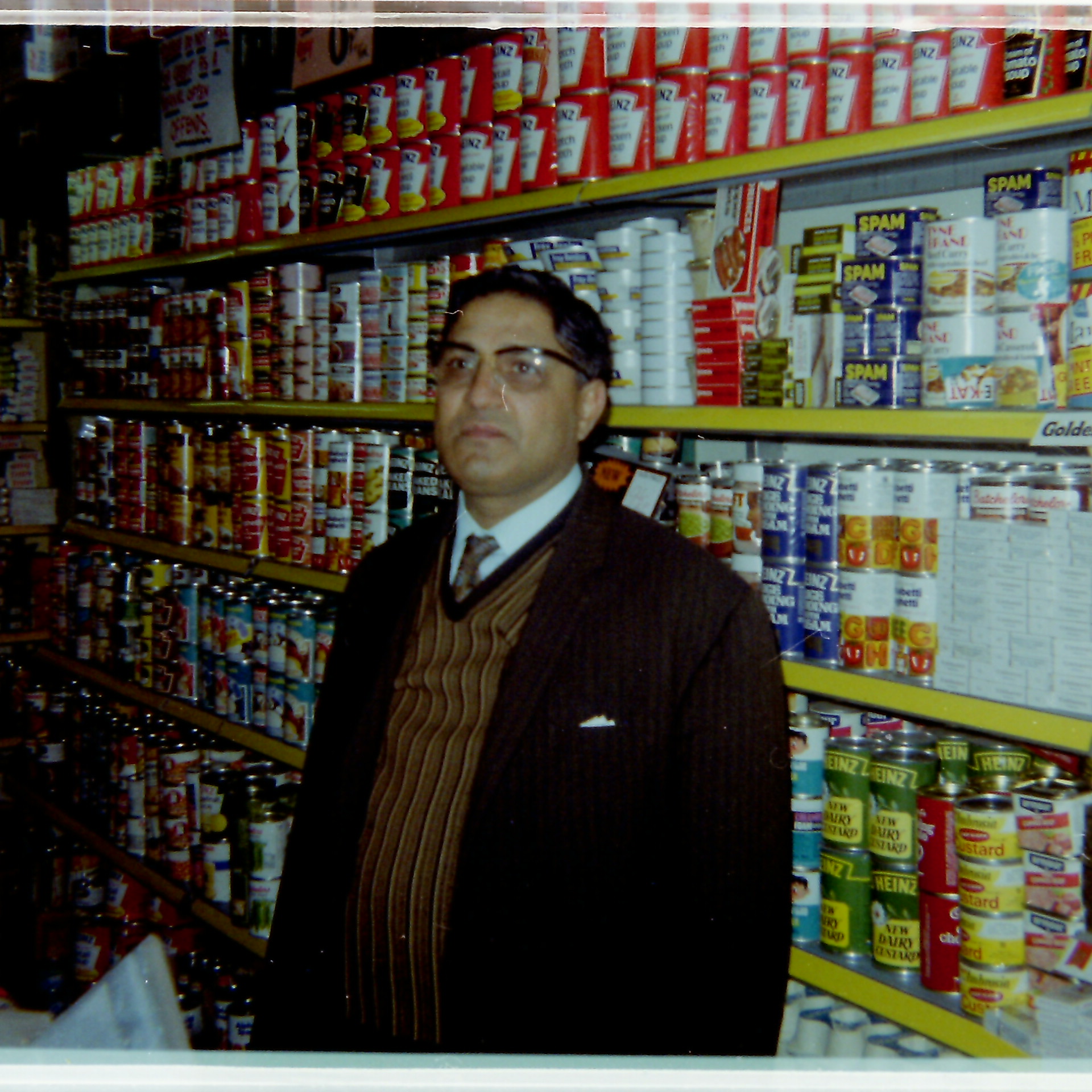 Fateh Ali standing in his store