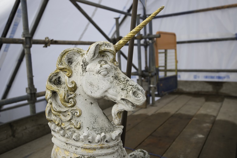 Close up of the carved unicorn prior to restoriation