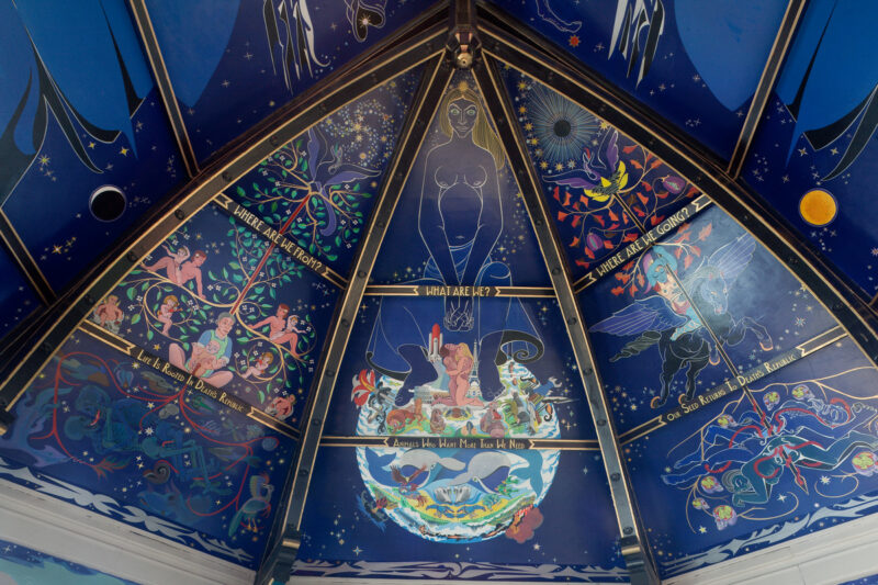 A photo of the Alasdair Gray mural on the ceiling of Oran Mor. 